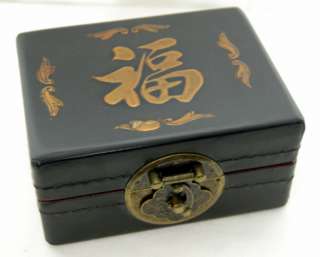   set features a gold fu design which symbolizes good fortune in chinese