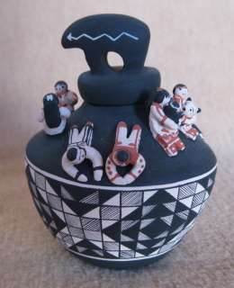 Cochiti Storyteller Pottery by Dena Suina  