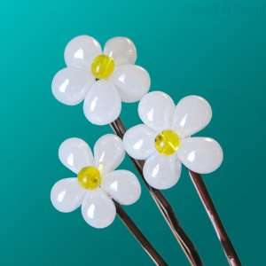   Pins   cute pearly white beaded flowers with yellow center Beauty