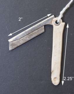 Small folding razor knife advertising Beggs and Cobb Tanners in Boston 