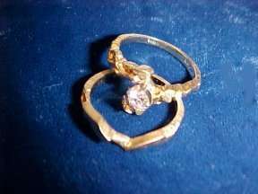 1983 yellow 14k gold wedding ring set, beautifully mounted with a .18 