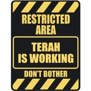   RESTRICTED AREA TERAH IS WORKING  PARKING SIGN