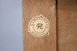 The label indicates that this sideboard was crafted by G.T. Rackstraw 
