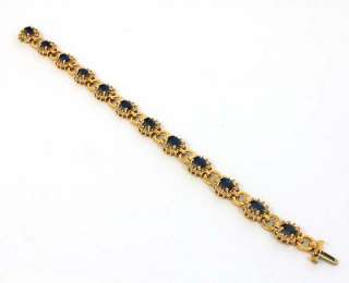   is a beautiful 14k gold diamonds and blue sapphires ladies bracelet