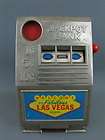 vintage reno plastic jackpot slot machine coin bank 