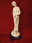 original 1987 g armani lady with a bouquet of flowers figurine returns 