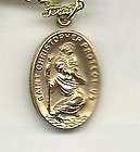 21 Small gold filled oval St Christopher necklace.
