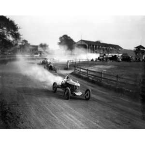  Racers Speed Around Dirt Track