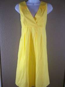 Beautiful, yellow cotton sun dress with surplice, wrap bodice; zip 
