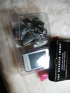 The Sharper Image Touch MP 4 Player 694202102961  