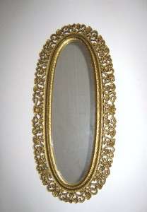 Vintage 1969 Oval Wall Mirror With Molded Gold Plastic Frame   USA 