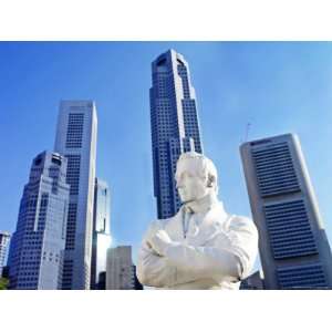  A Statue of Sir Stamford Raffles Against the Cityscape of 