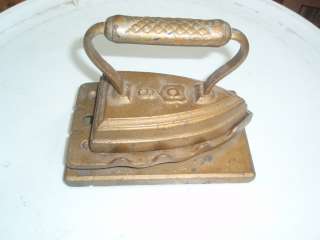 ANTIQUE GOLD PAINTED SIMPLEX HOT IRON WITH PLATE/HOLDER.  