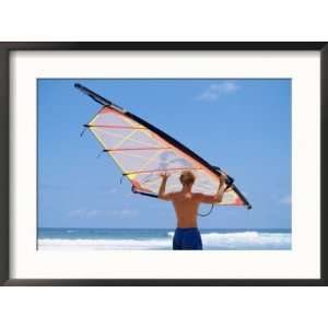  Rear View of a Young Man Holding a Windsurf Board Photos 